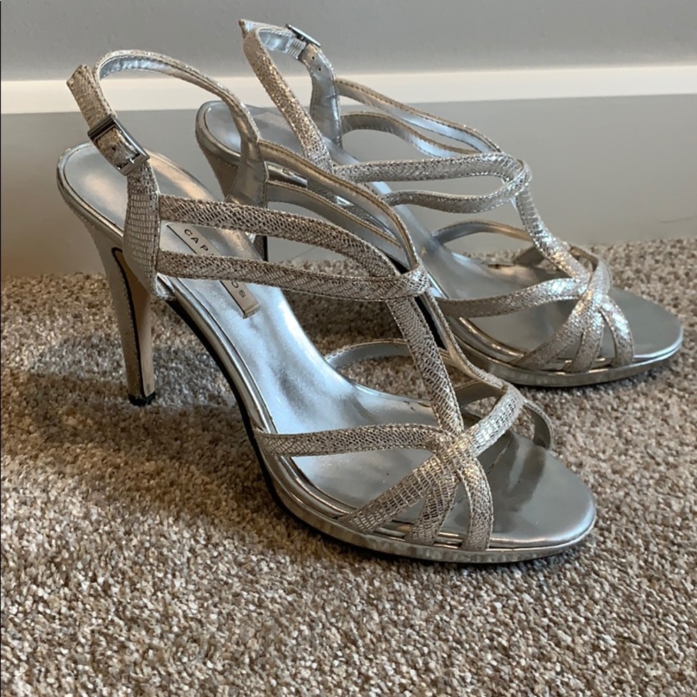 Silver high heels, worn twice